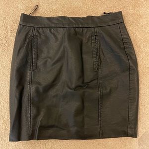 French collection black pleather mini skirt with little pockets in size 8